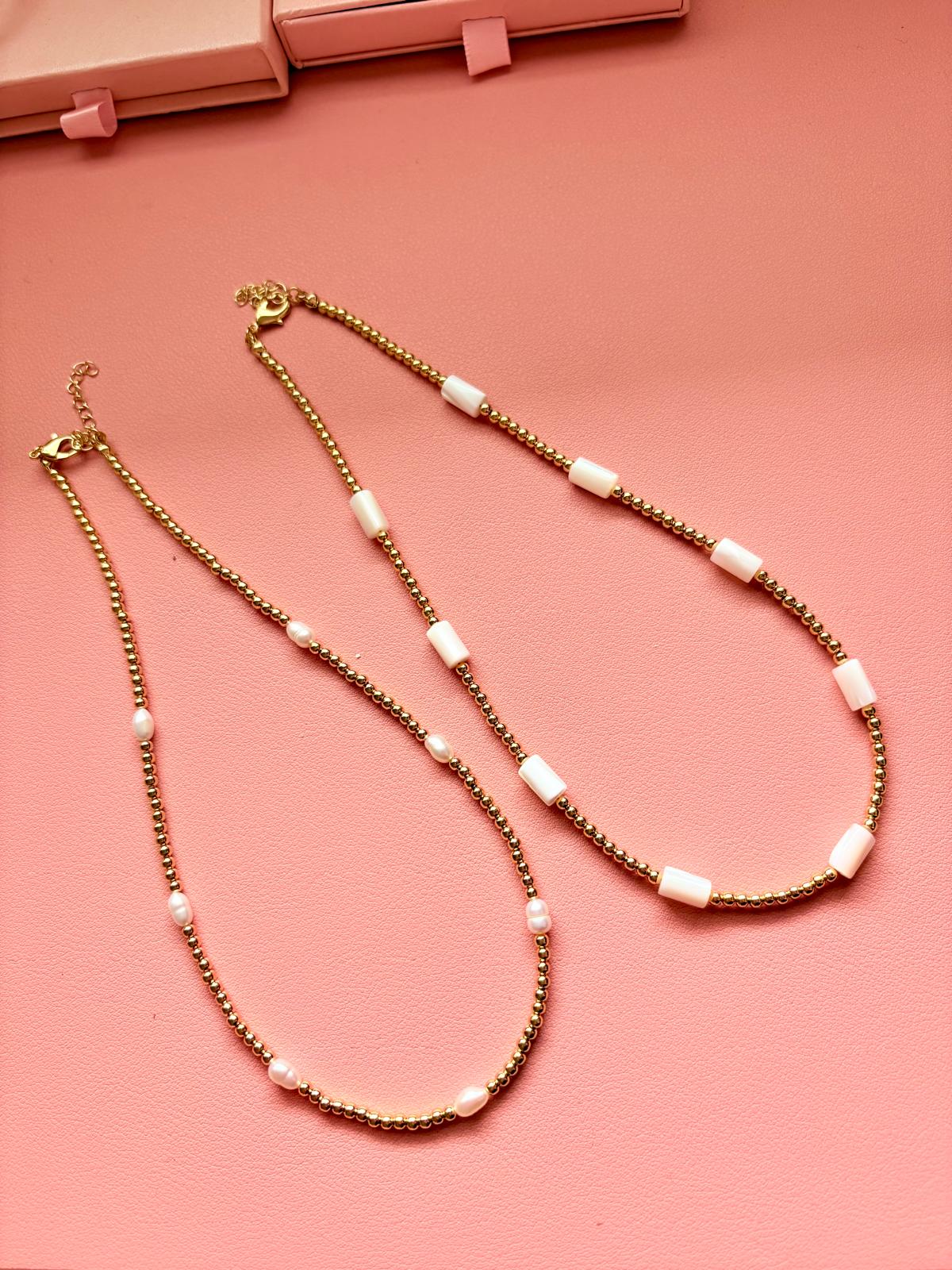 Collares balines y piedras