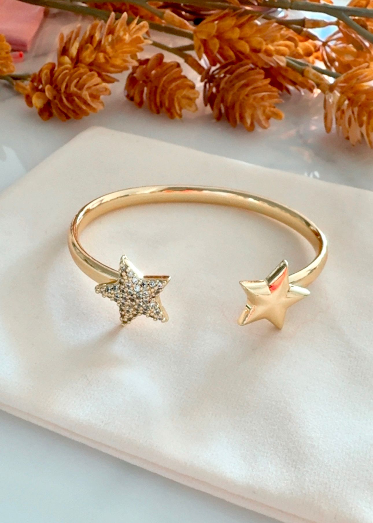 Brazalete doble estrella