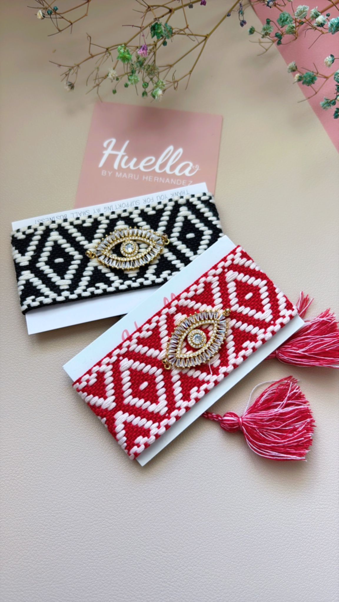Juego de dos pulseras tejidas Ojo