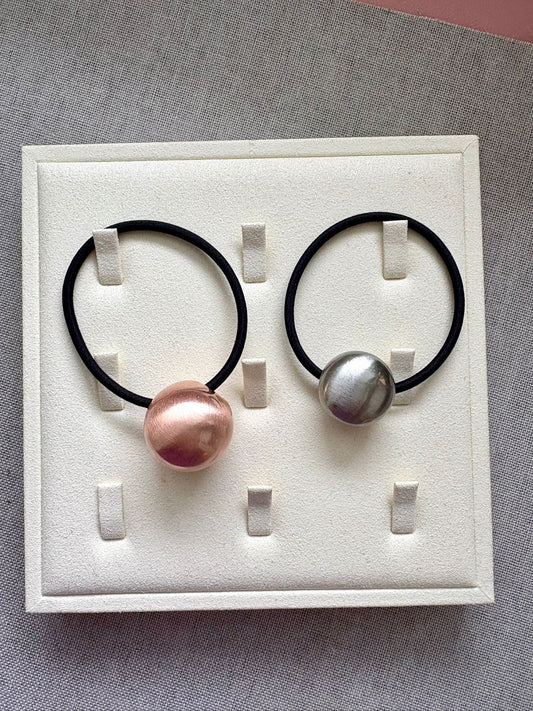 Accesorio en par para el cabello