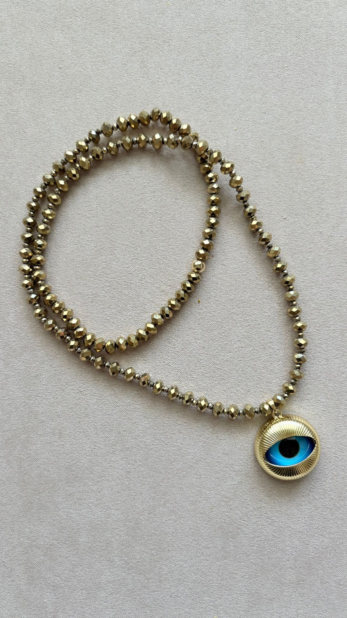 Cadena elástica ojo de Vidrio