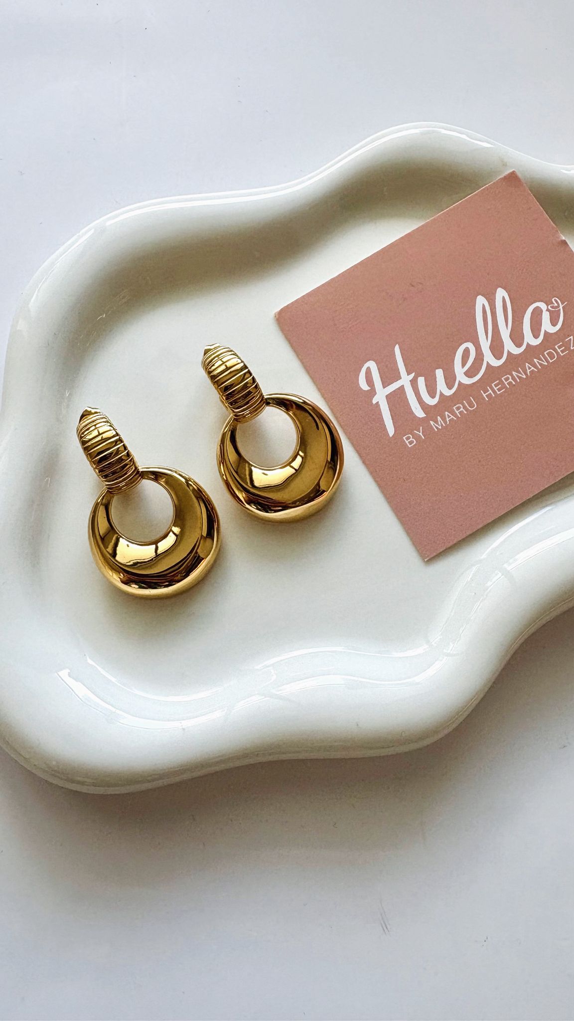 Aretes Modernos